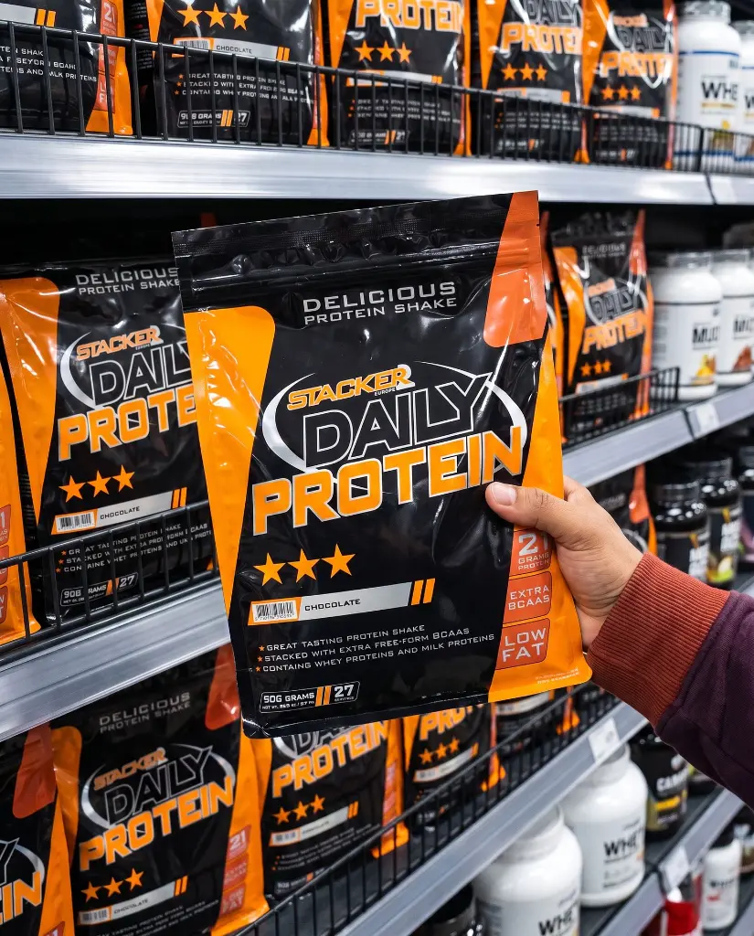 Sport-Nutrition_Photoshoot_Daily-Protein-Stacker-2_Snack-Aisle-Handheld_2026-08-25_1x.webp